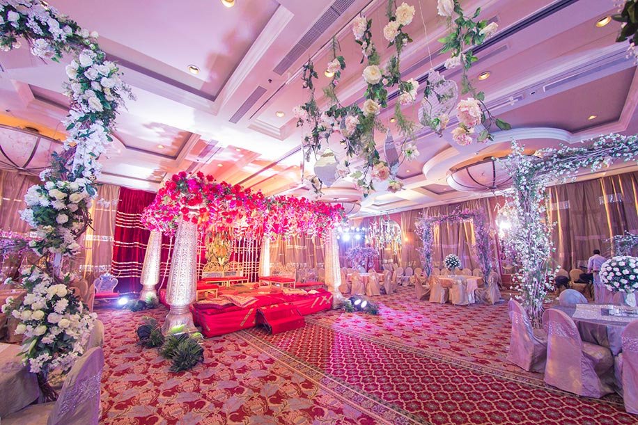 A pink floral wedding setting